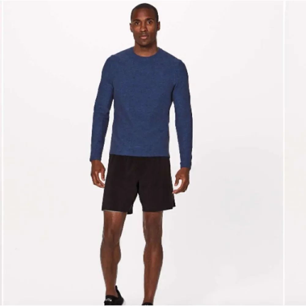 Lululemon Surge Warm Long Sleeve Blue shirt with zip pocket size S